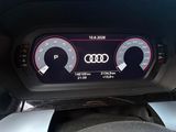 the dashboard of a car with a clock and gauges on it