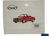 a box with a picture of a red car on it