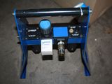 an image of a blue machine that is on the ground