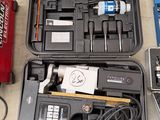 a lot of tools that are laying out on the floor