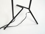 a small table with a lamp on top of it