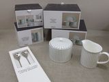 a box with a spoon and a cup and a box with a spoon and a box with a spoon and a box with a spoon and a spoon