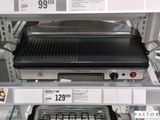 une photo d'un barbecue exposé dans un magasin