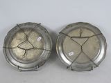 pair of antique silver plate with wire handles on white background