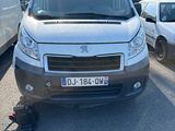 a white van that is parked in a parking lot