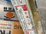 a close up of a bunch of papers on a table