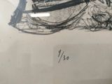 a black and white drawing of a boat on display