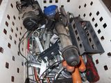 a basket full of assorted tools and tools in it