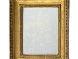 an image of a gold framed mirror on a white background
