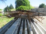 a pile of steel bars stacked on top of each other