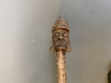 a statue of a man with a beard and a hat on it