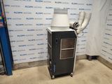 a machine that is sitting on a cart in a room