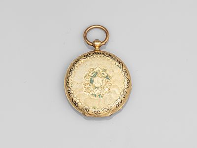 an antique gold locke with a picture of a woman on it