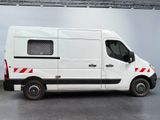 a white van that is parked in a garage