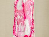 mannequin wearing a pink shirt and white pants on a white mannequin