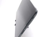 a close up of a laptop computer on a white surface