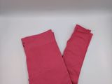 the leggings are pink and the leggings are red