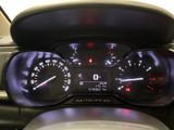 a close up of a car dashboard with a speedometer