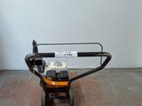a small machine that is sitting on the floor