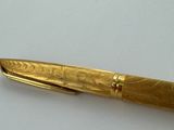 an image of a pen that is laying on top of a table