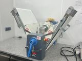 a machine that is sitting on a counter in a kitchen