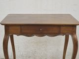 an image of a small table with a drawer on it