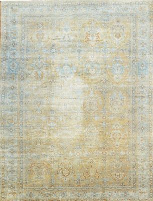 a blue and yellow rug with a medallion design on it