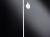 a white floor lamp with three lamps on top of it