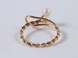 gold plated ring with a pearl and twisted wire