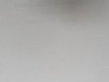 a white plate that has a black and white picture on it
