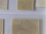 four different types of stamps are displayed on a white surface