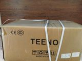 a box that is sitting on a bed with a tie around it