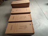 several cardboard boxes stacked on top of each other in a warehouse