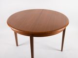 a close up of a table with a wooden top on a white background