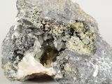 a close up of a piece of rock with a rock in the middle