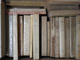 a lot of books that are sitting on a shelf
