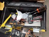 a tool box with tools in it on the floor