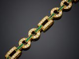 un bracelet en émeraudes et diamants, signé Cartier