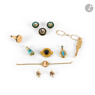 a group of jewelry including a broochle, earrings, and a pin