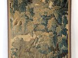 an image of a tapestry hanging on a wall next to a white wall