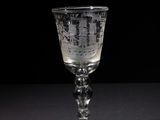a glass that is sitting on a table