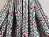 a close up of a rope with red and grey braiding