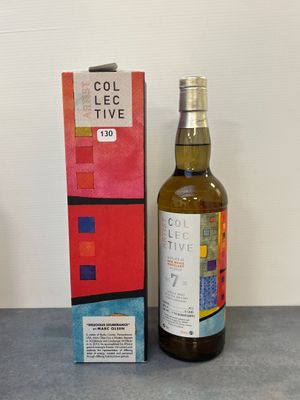 une image d'une bouteille de whisky à côté d'une boîte