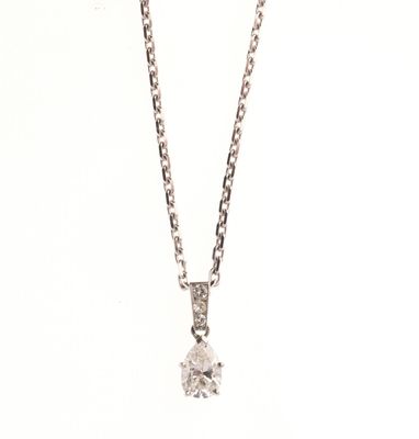 COLLIER en or gris 750 °/°° et pendentif sertie d'un diamant…