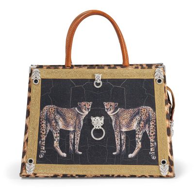 a leopard print handbag with two leopards on it