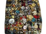 a picture of a box full of assorted jewelry