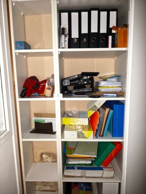 a book shelf with a lot of books on it