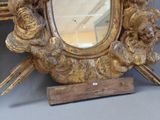 a mirror that is sitting on a table