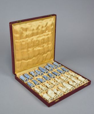 a box that has a lot of small bottles inside of it