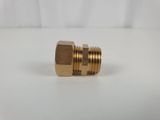a brass plated brass fitting for a hose
